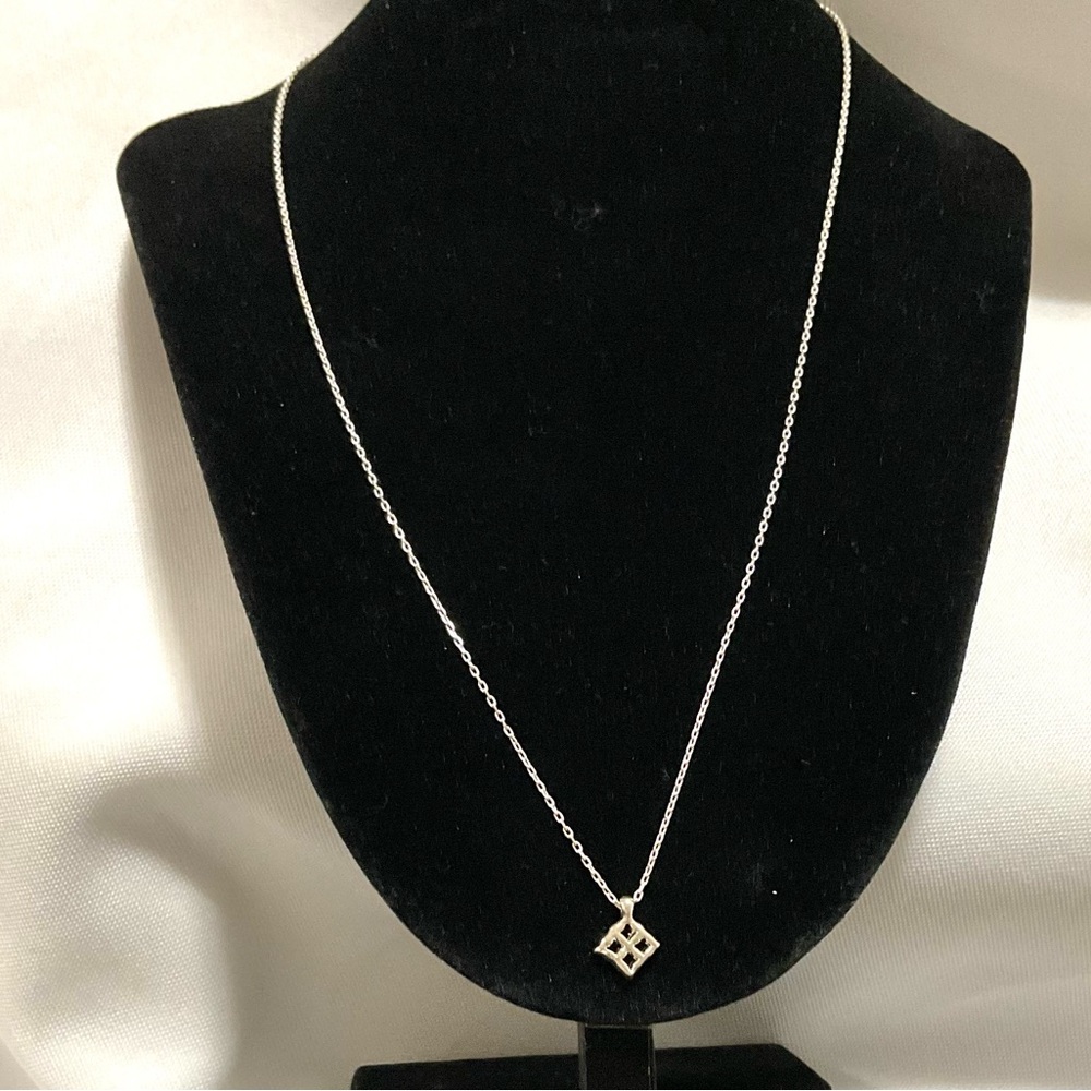 Elegant Adrinka Symbol Necklace with Geometric Pendant